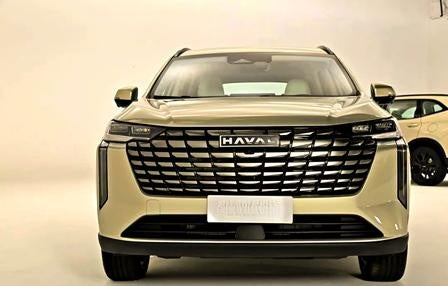 Front view of a champagne gold GWM HAVAL H6 SUV